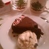 Dark chocolate cake, peppermint bark Häagen Dasz ice cream.