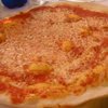 Margherita pizza. Moved inside when the downpour blew the canopies back.