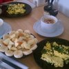 Christmas breakfast: steel cut oats, fruit, maple syrup; spinach, asiago eggs; eggnog.