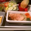 Dinner on the flight: Chicken with stuffing, spinach, carrots along with other bits.