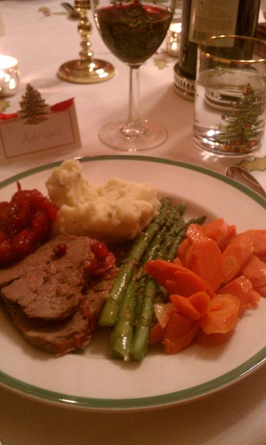 Beef tenderloin, lemon tarragon asparagus, mashed spuds with shallot butter, spiced applesauce, roasted carrots & onions.