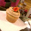 Elvis: banana, peanut butter chips, peanut butter chocolate buttercream, chocolate ganache, Elvis-y toppings.