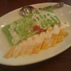 Khao niao mamuang (sweet glutenous rice, served warm, with mango and sweetened coconut milk).