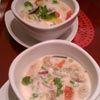 #LocalRestWeek Two bowls of tom kha (coconut milk) soup, one with beef, one with dessicated hippie bits.